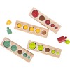 Jeu d’emboitement multicolore, d’inspiration Montessori en bois